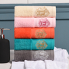 Tela de rizo lisa de lujo 100% algodón blanco con logotipo Juegos de toallas de spa de hotel